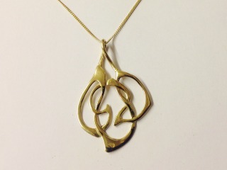 Open work Archibald Knox style pendant