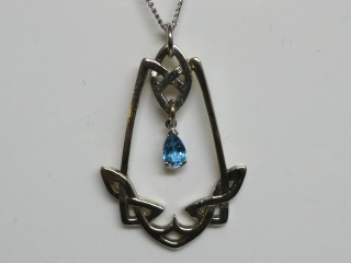 9ct white gold with Blue Topaz