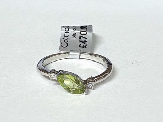 Peridot & diamond ring