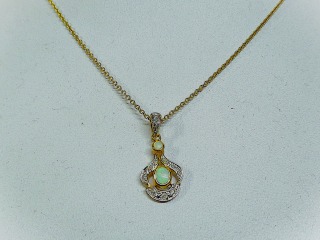 Opal & diamond pendant