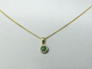 Emerald & diamond pendant