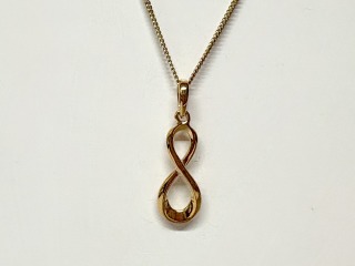 Gold infinity pendant 