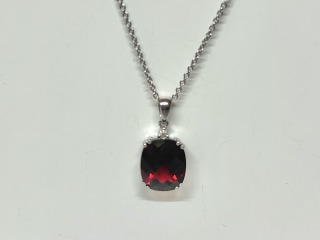 Garnet and diamond pendant