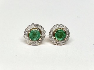 Emerald and diamond earrings.