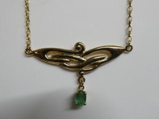 9ct yellow gold with Emerald