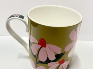 Green with pink flowers.- Ceramic mug.