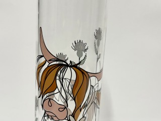 Highland cow glass water bottle.