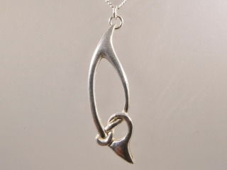 Open work Archibald Knox style pendant