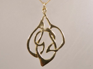 Open work Archibald Knox style pendant