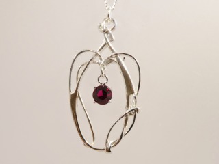 Silver Celtic Pendant with red cz