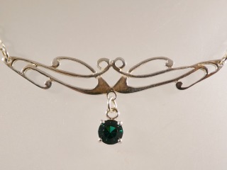Silver Celtic necklace with green cz