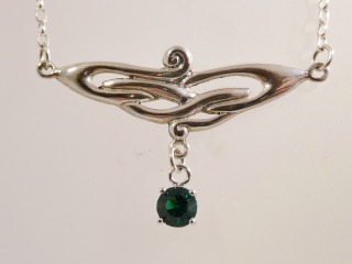 Silver Celtic necklace with green CZ
