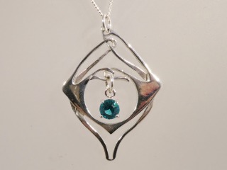Silver Celtic Pendant with teal cz