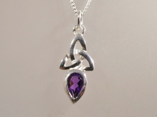 Silver Celtic Pendant with Amethyst colour stone