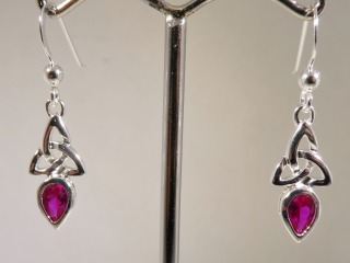 Silver Celtic earrings with Ruby colour stone