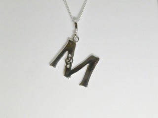 Celtic initial M