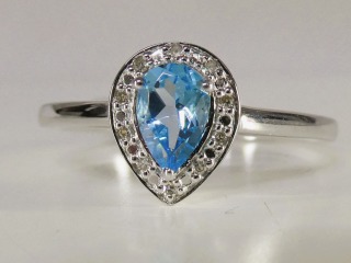 Blue topaz & diamond ring