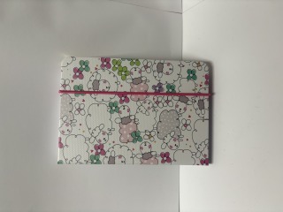 Sheep notebook and pen.