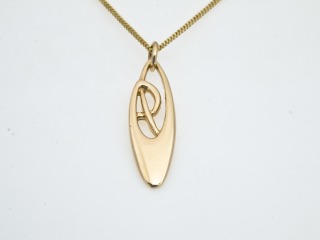 Open work Archibald Knox style pendant